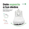 Zapatillas blancas vista frontal con puntera ancha barefoot.