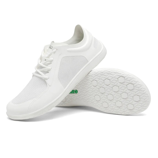 Suela flexible y totalmente plana (zero drop) de zapatillas Saguaro Wish II blancas, diseñada para una pisada natural.