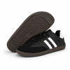 Zapatillas minimalistas negras urbanas ZZFABER Niza 2.0, calzado barefoot elástico de suela plana flexible drop cero para oficina en Santiago.
