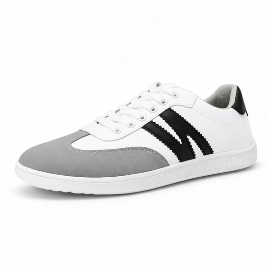 Zapatilla minimalista ZZfaber Niza I blanco con negro vista diagonal.