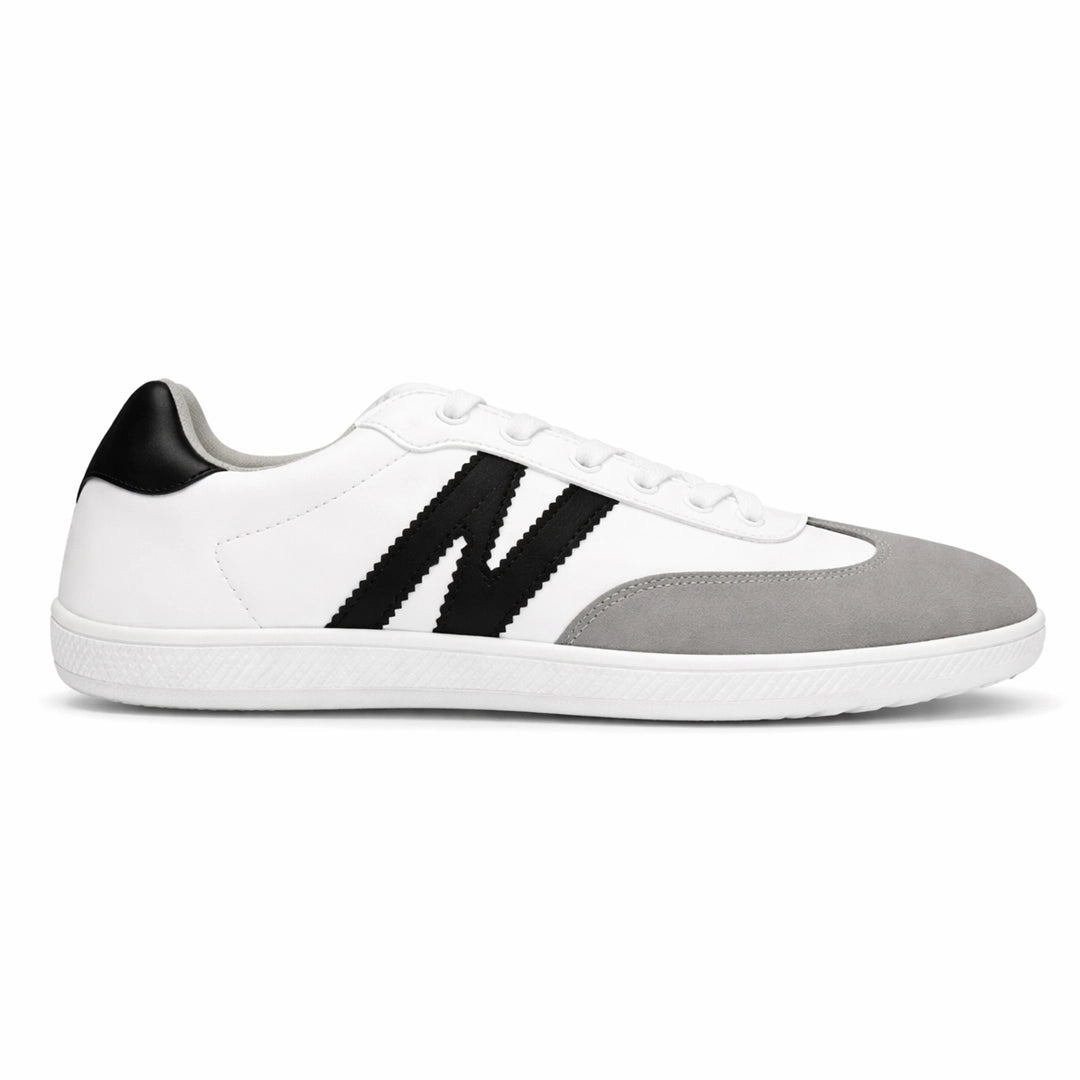 Zapatilla barefoot ZZfaber Niza I blanco con negro vista lateral.